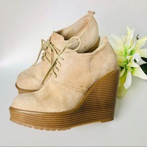 Beige suede wedge booties